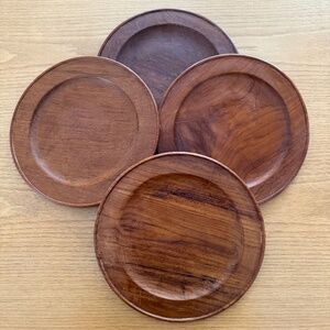 SET OF 4 VINTAGE TEAKWOOD PLATES
